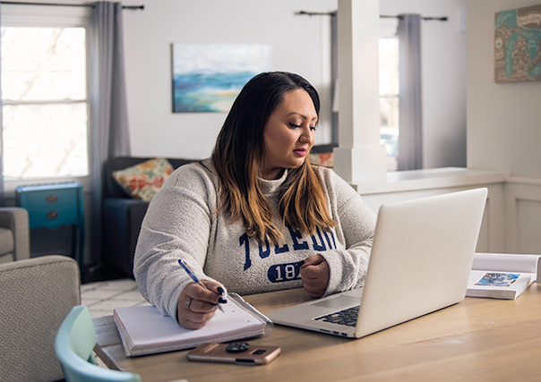 Student studying at a computer