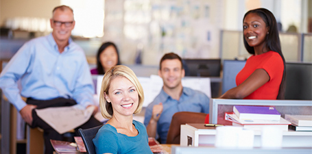 group shot of adults in an office