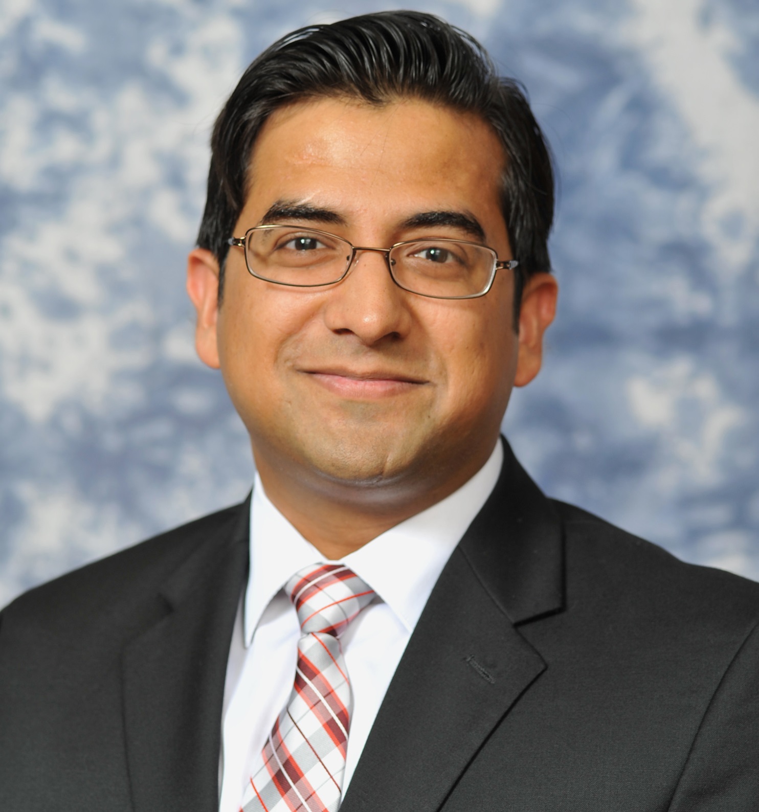 smiling man in suit