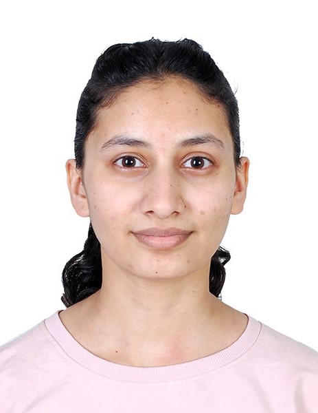 Prativa posing in front of white background.
