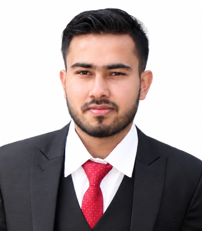 Suraj posing in front of white background.