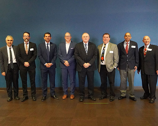 Means inductees posing with Mohammad Elahina and Steven Kramer