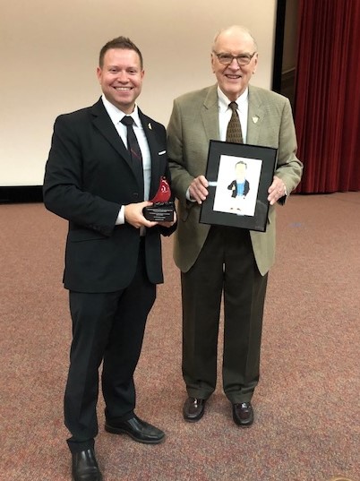 Ryan Sochol with Ted Keith accepting award