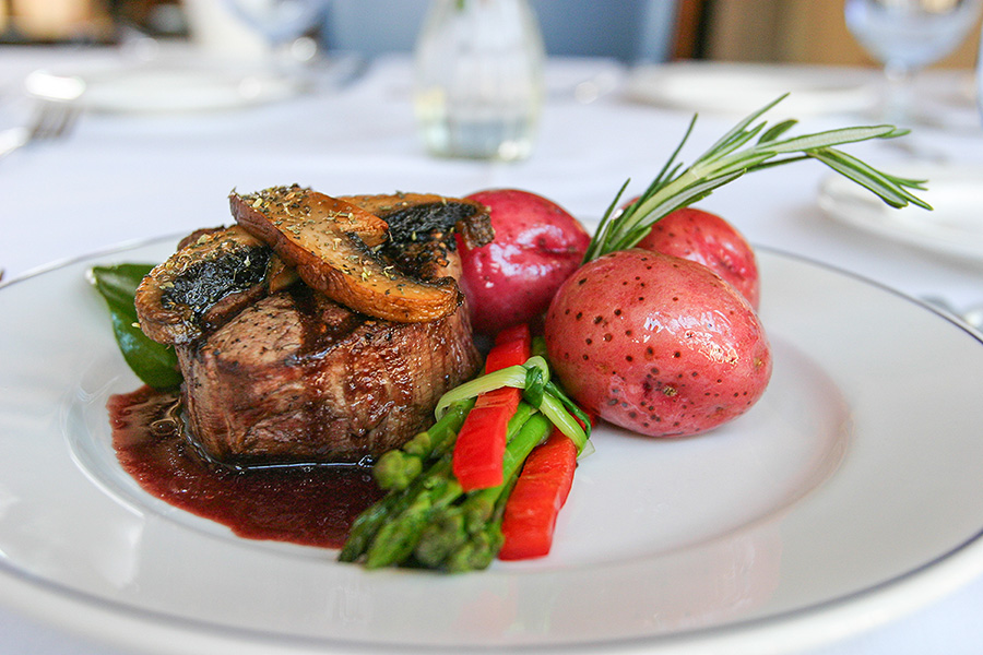plated dish of steak and potatoes