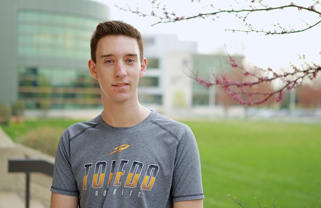 Jacob Connolly standing outdoors at UTMC