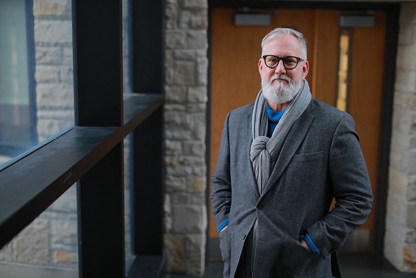 Dr. Brandon Cohen standing on UToledo's campus