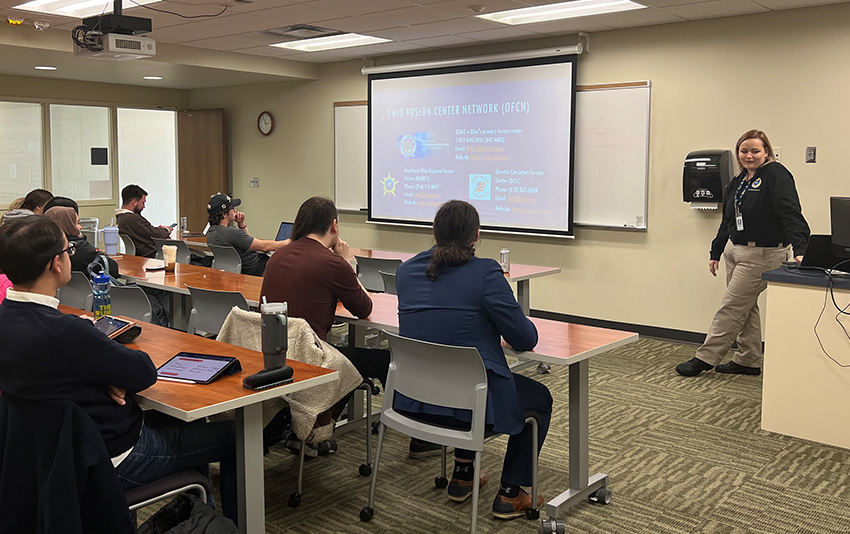 A classroom of students being given a presentation.