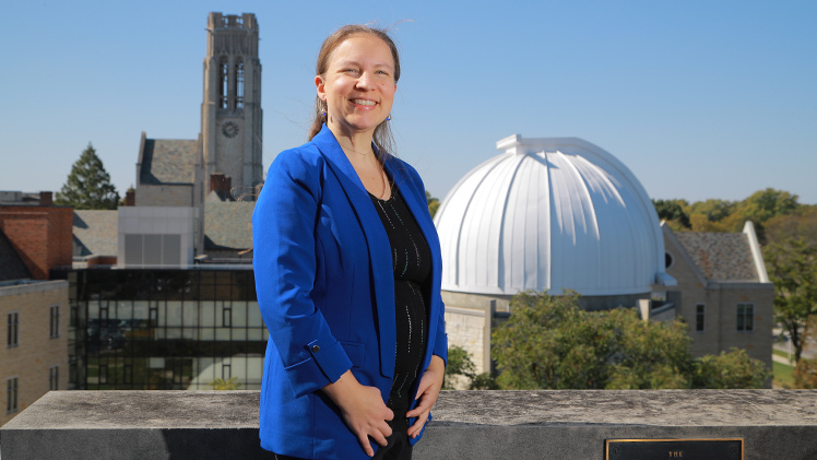 Anne Medling, Ph.D., standing outside on UToledo's campus