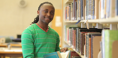 Male student in library Male student in library