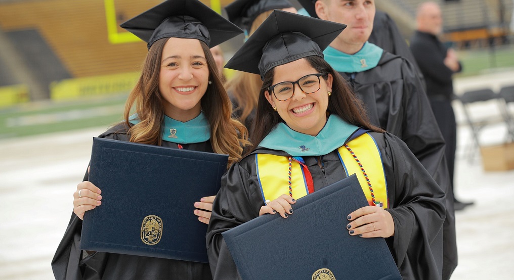 Higher Ed Masters students at commencement