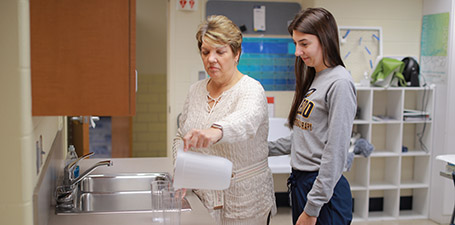 teacher and student in a lab