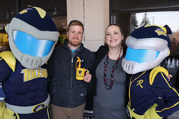 Micah Lawson, graduate music student, pictured with Adrienne King, Rocky and Rocksy