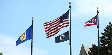 UToledo Flag, United States Flag, Ohio Flag, Prisioner of War/Missing in Action Flag flying full mast of flag poles