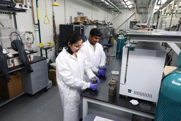 Environmental Portrait of Solar Researchers Alisha Adhikari and Scott Lambright, both physics doctoral students, recently led research into how solar cells perform in outer space with post-doctoral researcher Vijay Karade. Their work is funded by the Air Force Research Laboratory and published in the peer-reviewed journal Solar RRL. Alisha Adhikari, Vijay Karade