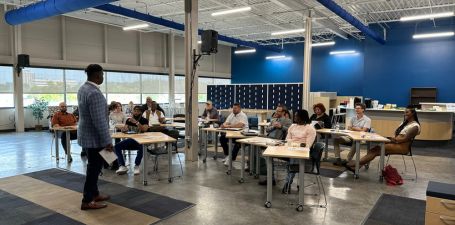 group of people attending a financial forecasting event at the utoledo minority business development center