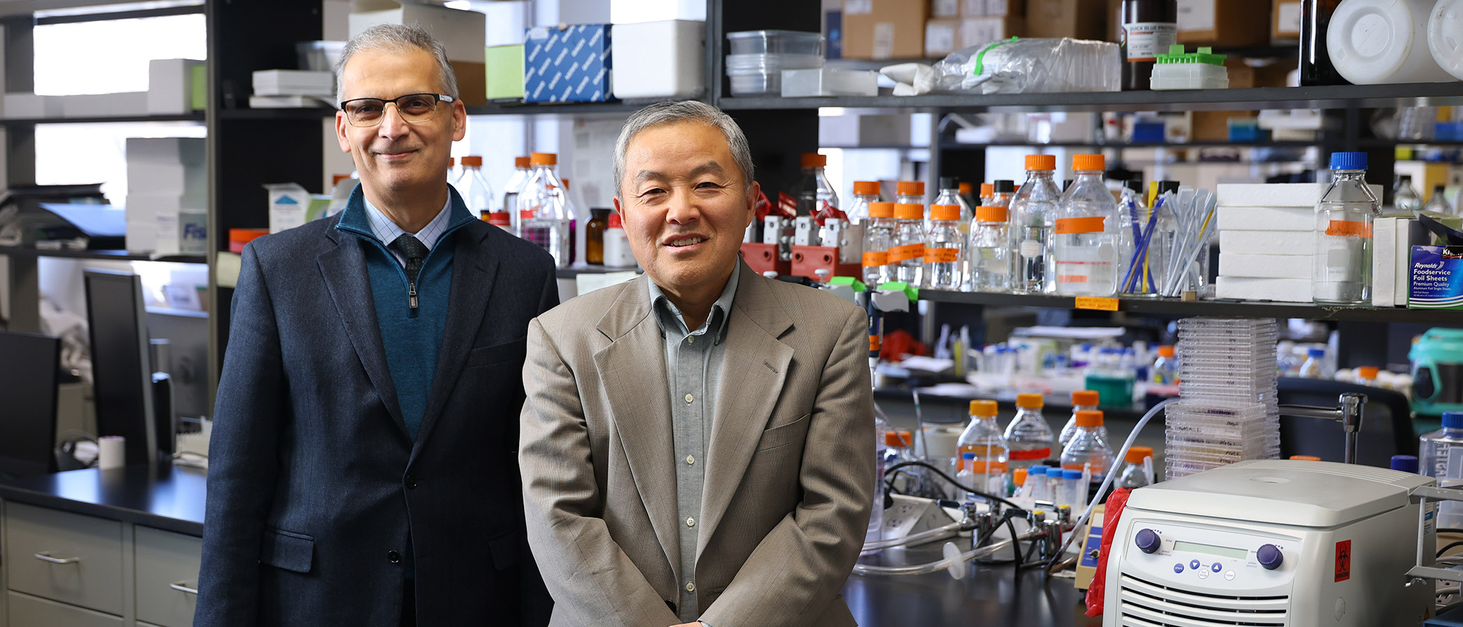 Dr. Imran Ali, left, is dean of the College of Medicine and Life Sciences, while Dr. Jian-Ting Zhang, right, is a professor in UToledo’s College of Medicine and Life Sciences and the inaugural director of the Northwest Ohio Cancer Research Institute.