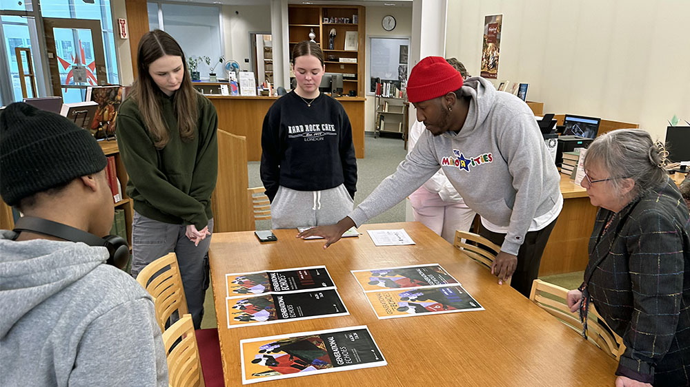 Graphic Design and Art History Students Designing an Exhibition