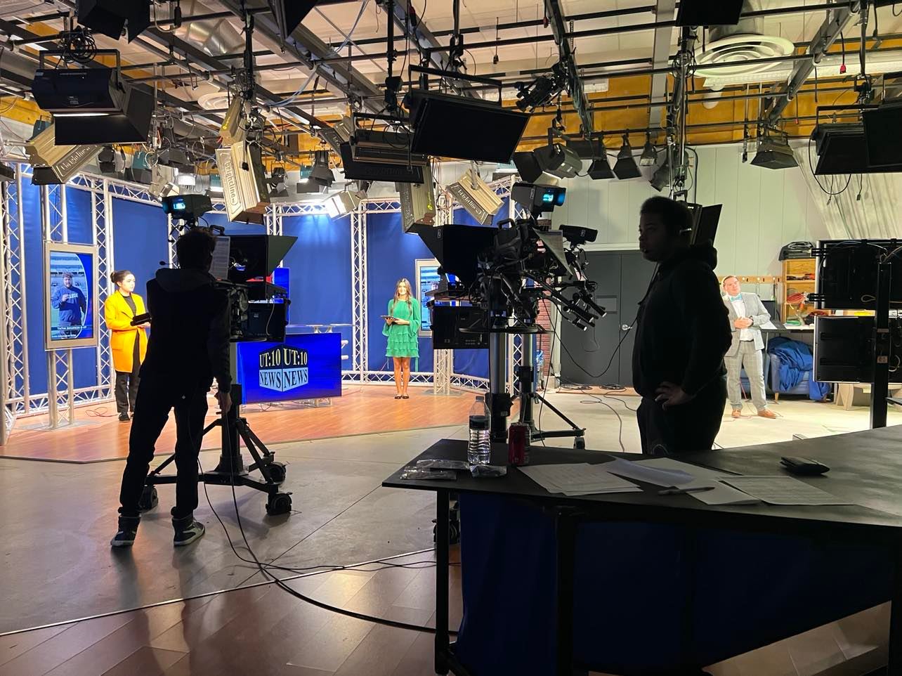 students operating cameras during broadcast