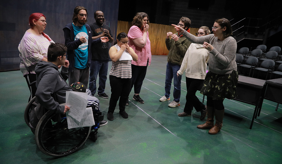 students standing on a performance stage for the Inclusive Performing Arts Camp