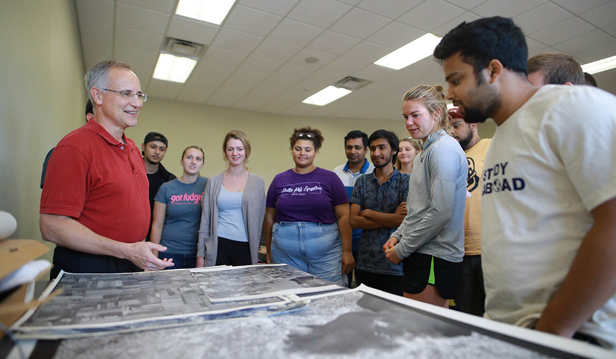 students reviewing maps in a hands on classroom experience