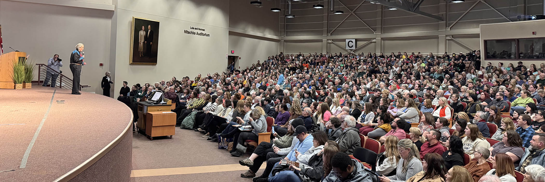 Nitchke Auditoriam filled with people attending a past Shapiro Lecture Series
