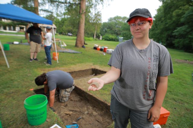 anthropology student at a on-site dig