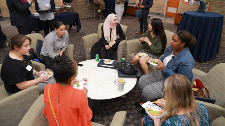 group of students socializing in forum