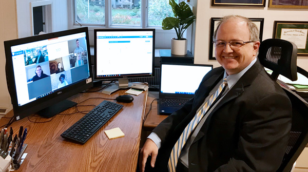 Clinic Director Chris Bourell leads student attorneys in virtual seminar