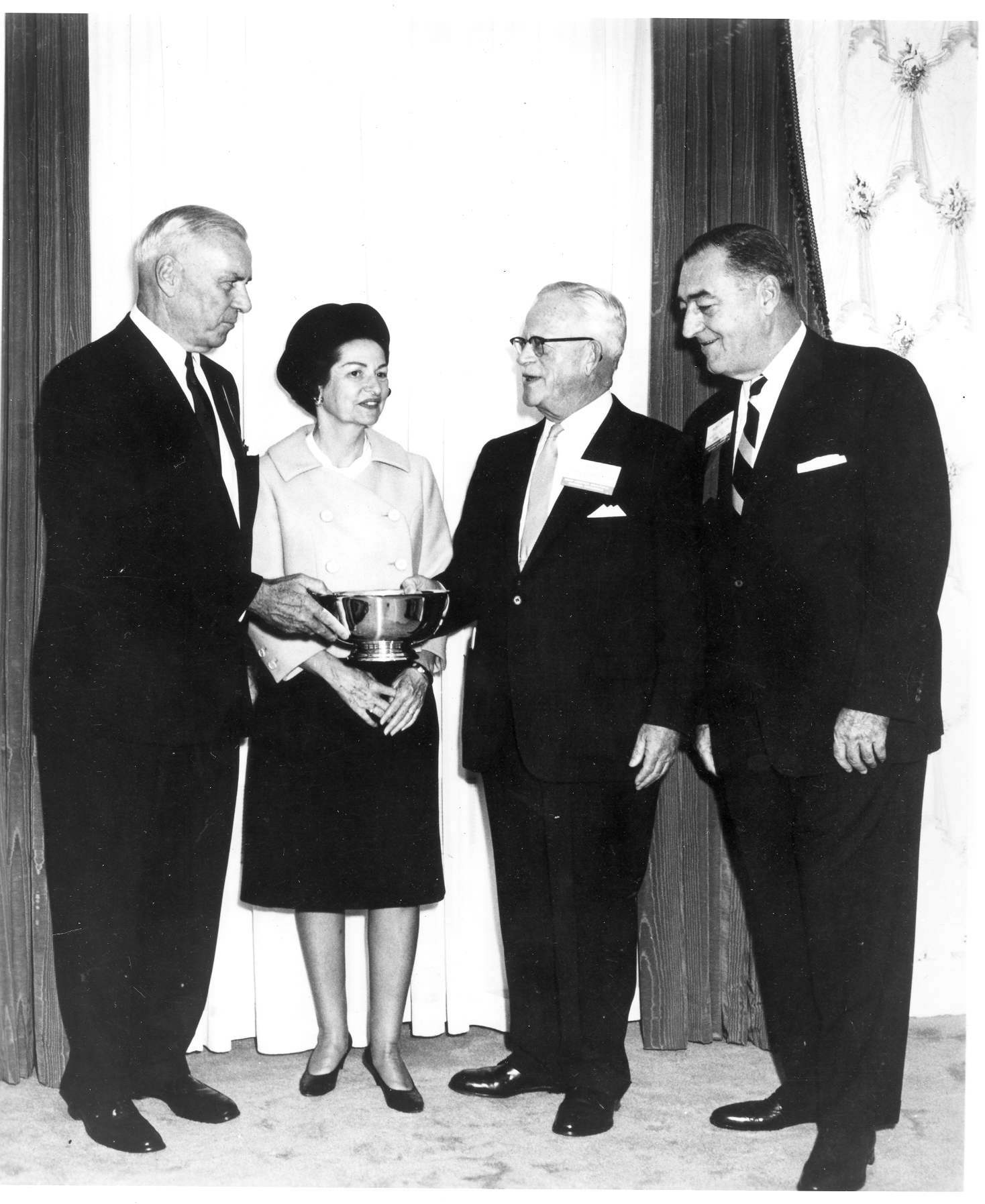 Ladybird Johnson presents a Keep America Beautiful Award to Owens-Illinois in 1965