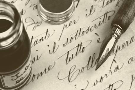 Ink pen and pot on top of written document