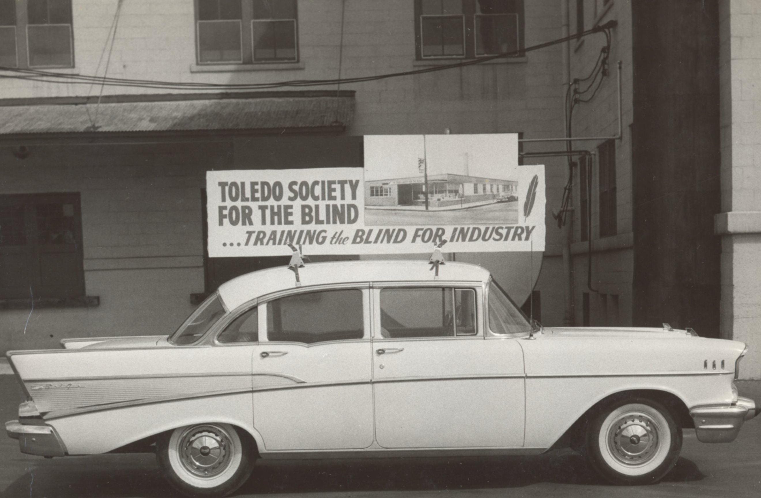 Sight Center sign above car