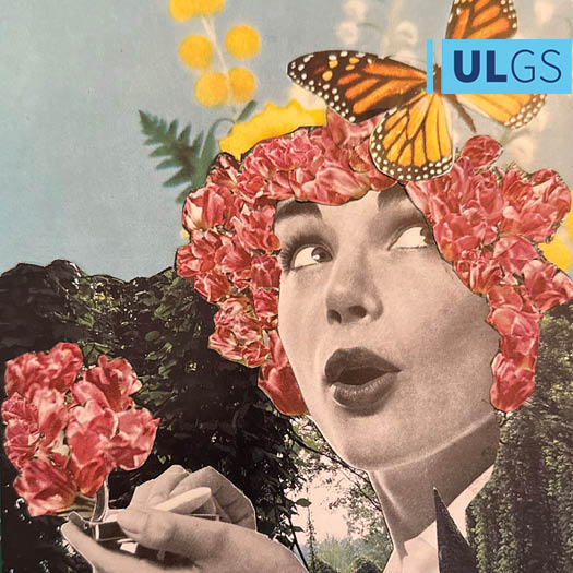 woman with flower hair looking at a butterfly in surprise