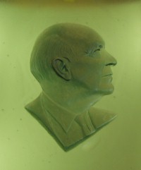 Raymon H. Mulford in bas relief in glass