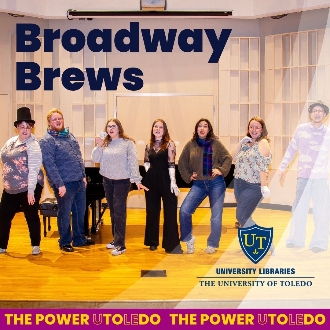 voice students posing on stage in front of a piano