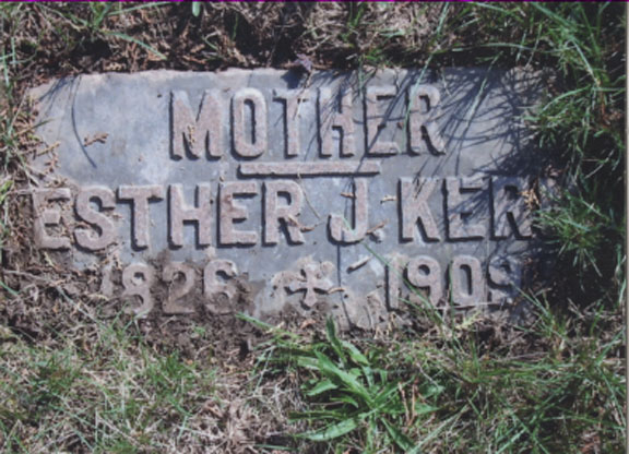 grave marker with patient's name and biographical information