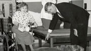 Former Vice-President Dan Quayle with an assistance dog