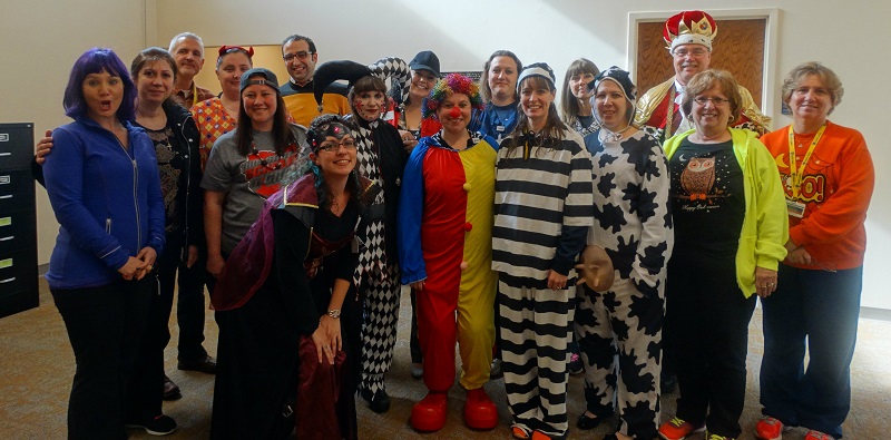 Staff members dressed for Halloween