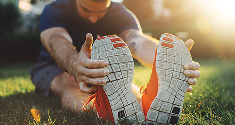 Photo of man stretching.