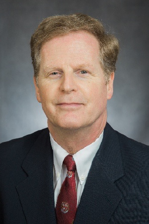 Headshot of Dr. Eric R. Carlson