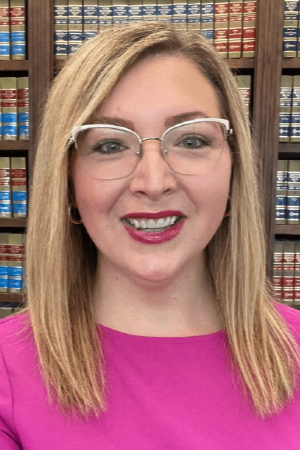 Headshot of Courtney K. Combs, J.D.