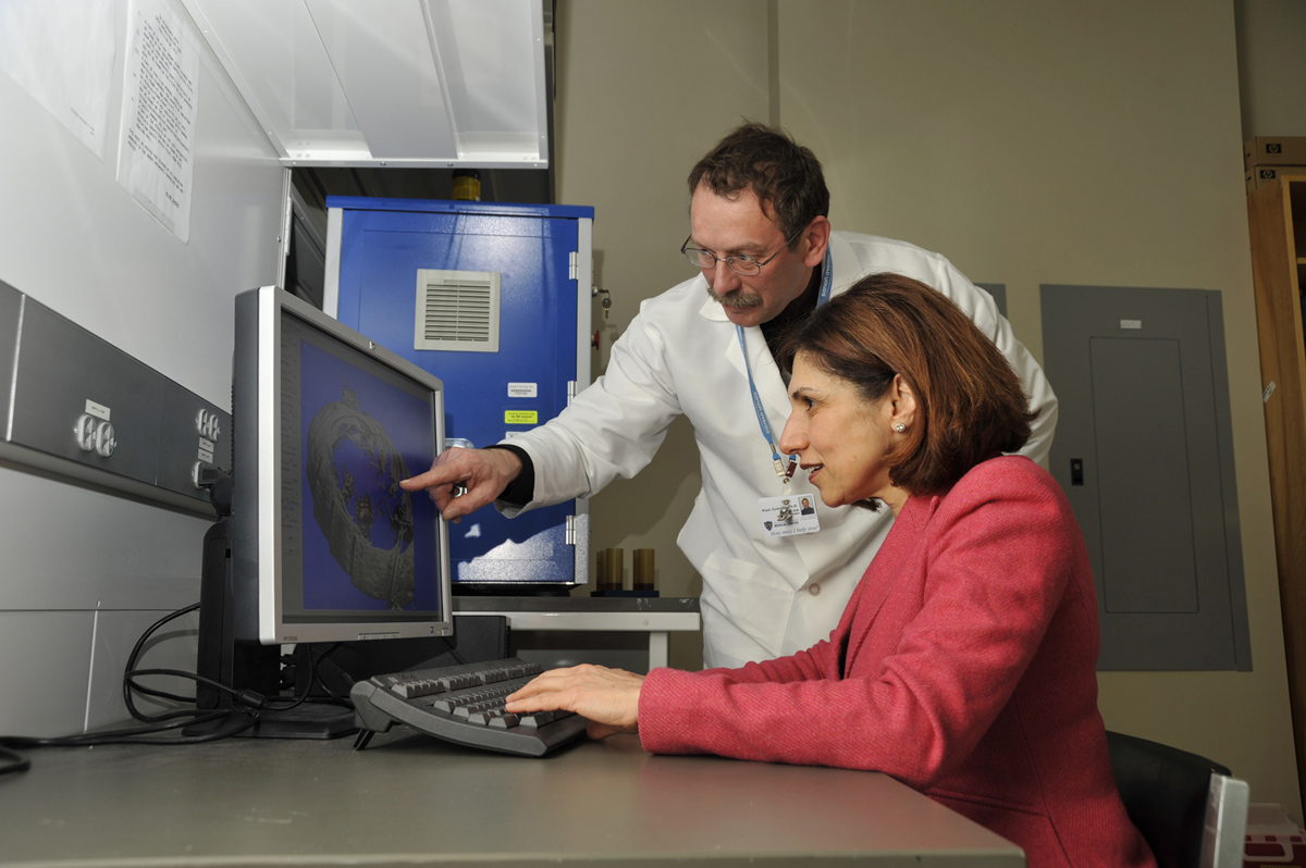 woman and man working on computer in lab