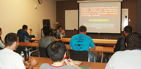 Students attending a seminar viewing a presentation