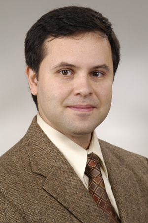 Claudiu Georgescu, M.D,. AAHIVS