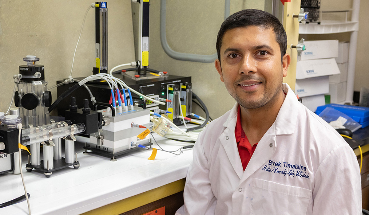 Bivek Timalsina, a Ph.D. student in the Medical Microbiology and Immunology track of our Biomedical Science Program, is pictured at a research bench in the laboratories of Drs. David Kennedy and Steven Haller.