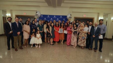 neurology department and family at graduation