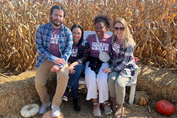 Isaac, Quynh, Tannice, and Jena at a pumpkin patch