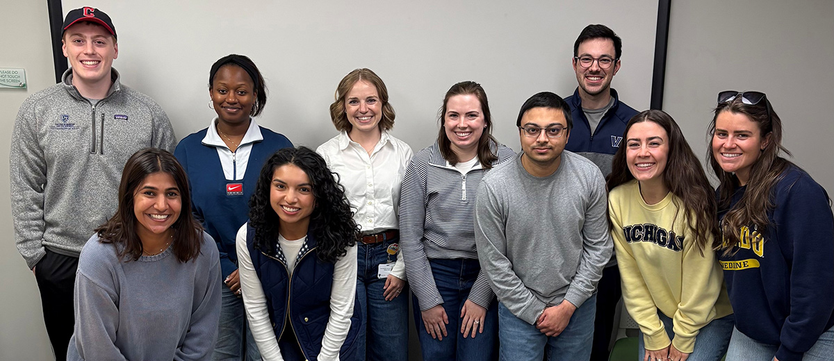A group of learners pose for a photo