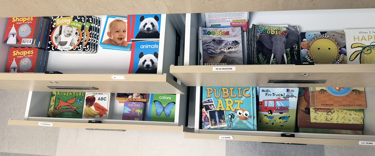 A drawer of books for different ages for the program.