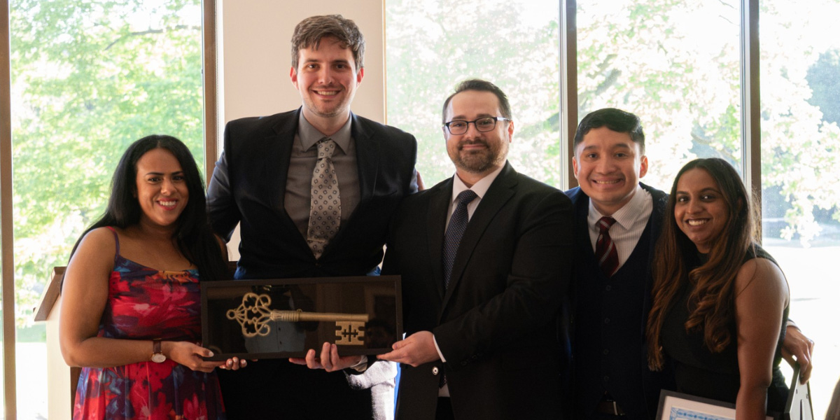 A photo of the pedsd chiefs accepting an award