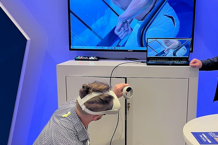 Photo of resident using a simulator